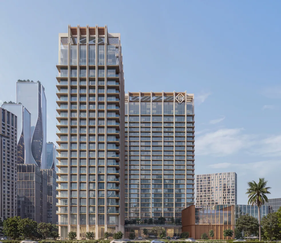 The Residences DIFC towers by day beside the DIFC skyline